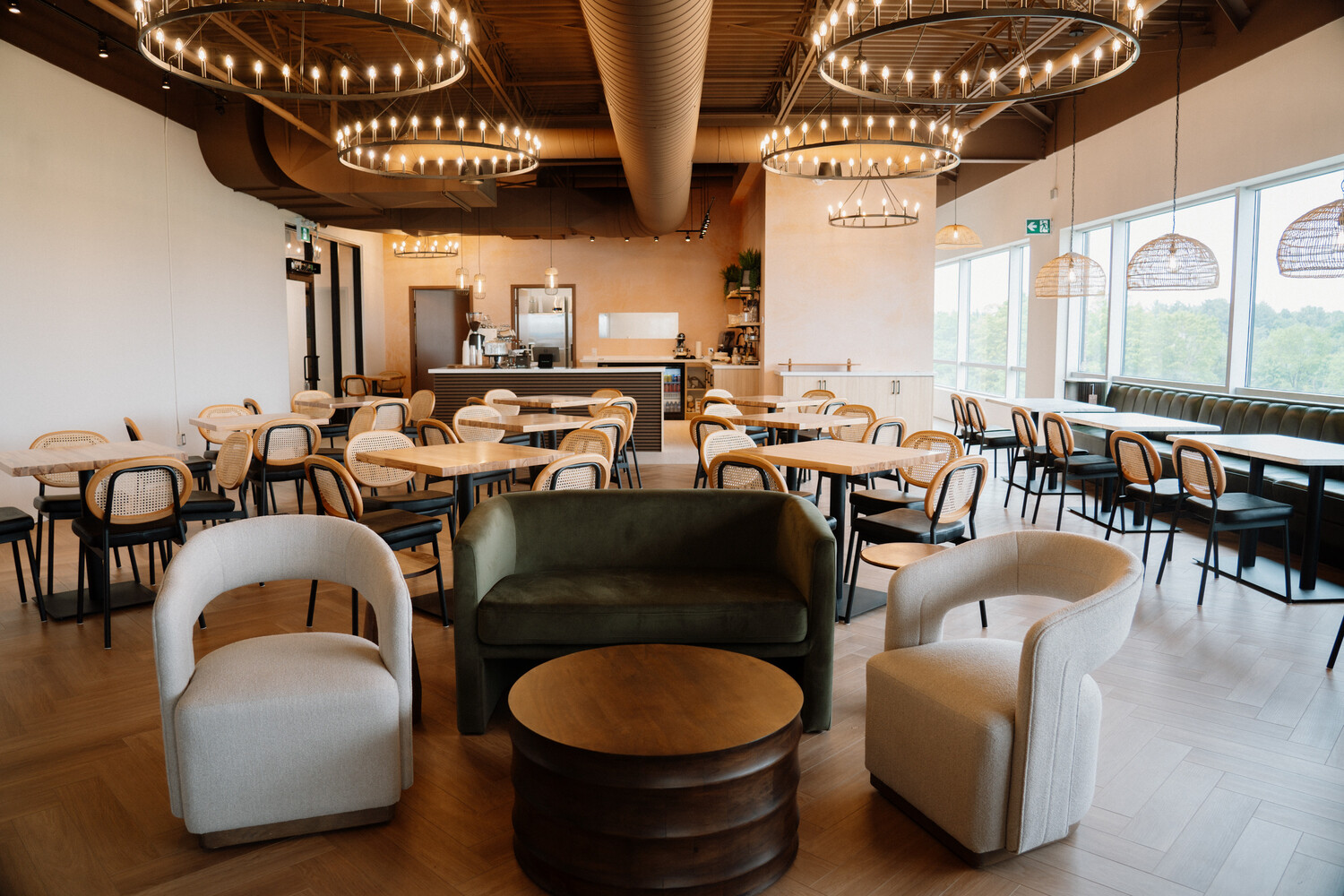 Café lounge seating with warm pendant lighting