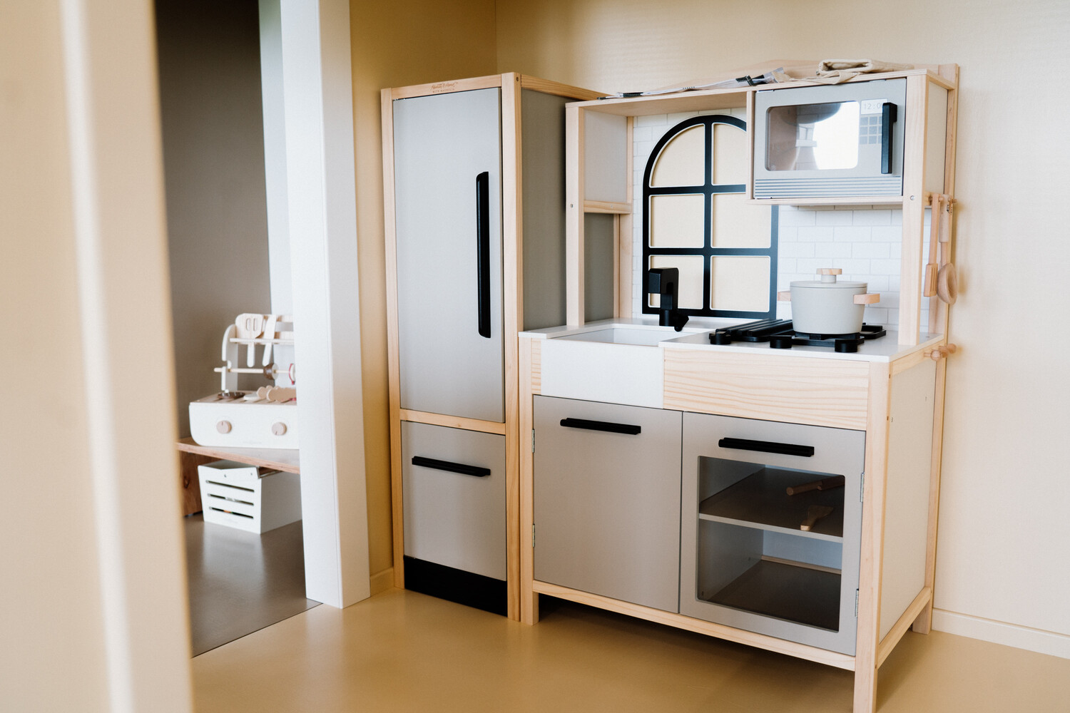 Montessori play kitchen with fridge
